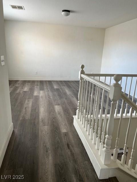 11173 Hickory Glen St, Las Vegas, NV 89179 - stairs featuring wood finished floors and baseboards