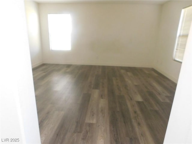 11173 Hickory Glen St, Las Vegas, NV 89179 - empty room with wood finished floors