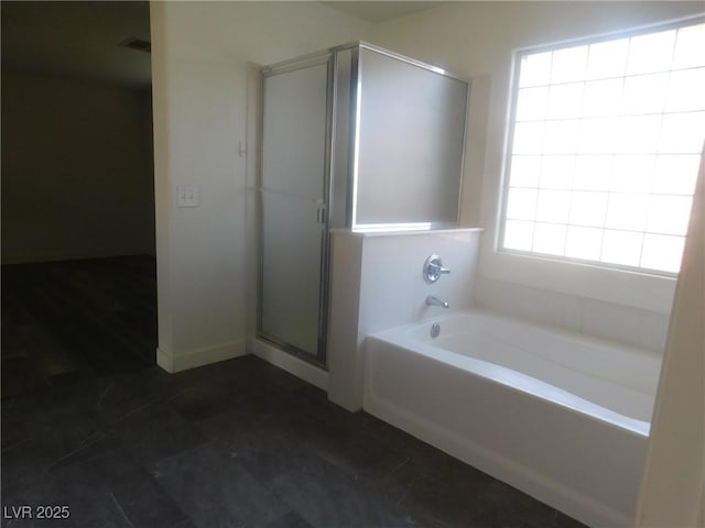 11173 Hickory Glen St, Las Vegas, NV 89179 - full bath with a shower stall and a garden tub