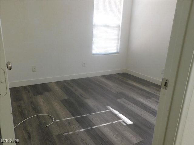 11173 Hickory Glen St, Las Vegas, NV 89179 - empty room featuring wood finished floors and baseboards