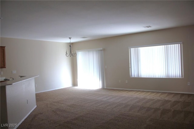 2212 Sawtooth Mountain Dr, Henderson, NV 89044 - carpeted empty room with baseboards