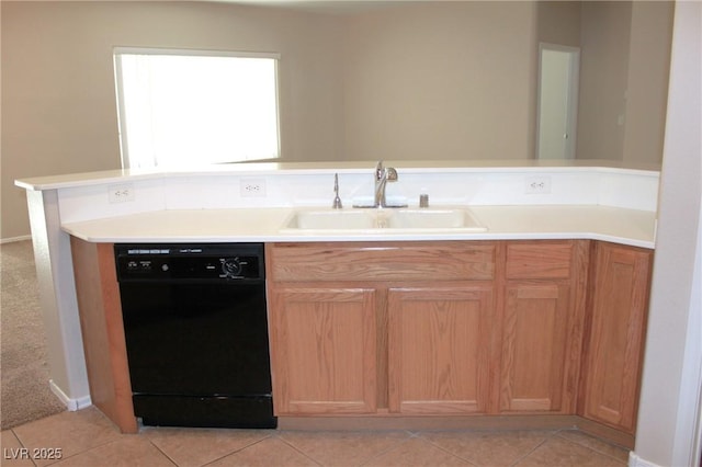 2212 Sawtooth Mountain Dr, Henderson, NV 89044 - kitchen with dishwasher, a sink, light countertops, and light tile patterned flooring