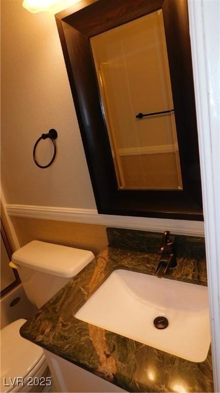 3606 Gold Sluice Ave, North Las Vegas, NV 89032 - half bath featuring vanity and toilet