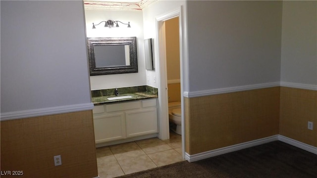 3606 Gold Sluice Ave, North Las Vegas, NV 89032 - bathroom featuring toilet, vanity, and tile patterned floors