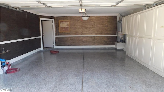 3606 Gold Sluice Ave, North Las Vegas, NV 89032 - garage featuring gas water heater, a garage door opener, and baseboards