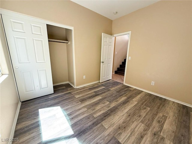 3736 Gallowtree Ave, North Las Vegas, NV 89081 - unfurnished bedroom with wood finished floors and a closet