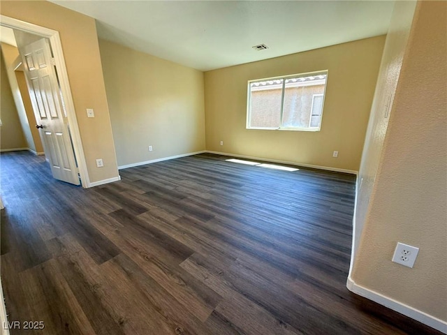 3736 Gallowtree Ave, North Las Vegas, NV 89081 - empty room featuring dark wood-type flooring and baseboards