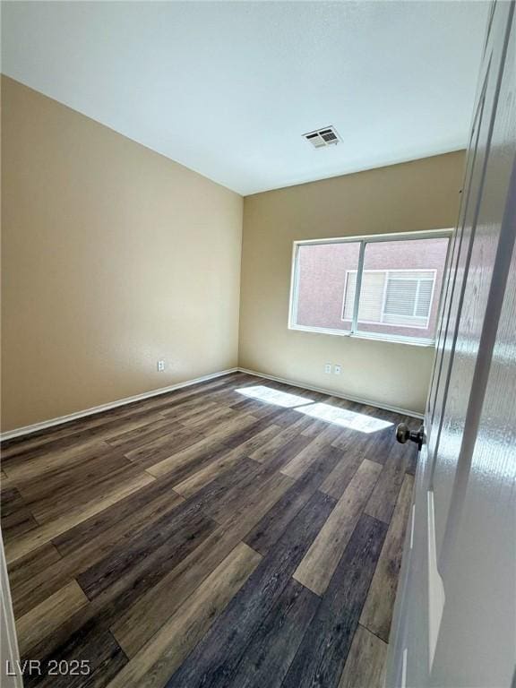 3736 Gallowtree Ave, North Las Vegas, NV 89081 - unfurnished room with wood finished floors and baseboards