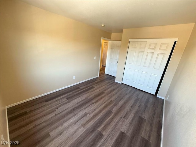 3736 Gallowtree Ave, North Las Vegas, NV 89081 - unfurnished bedroom with dark wood finished floors and a closet