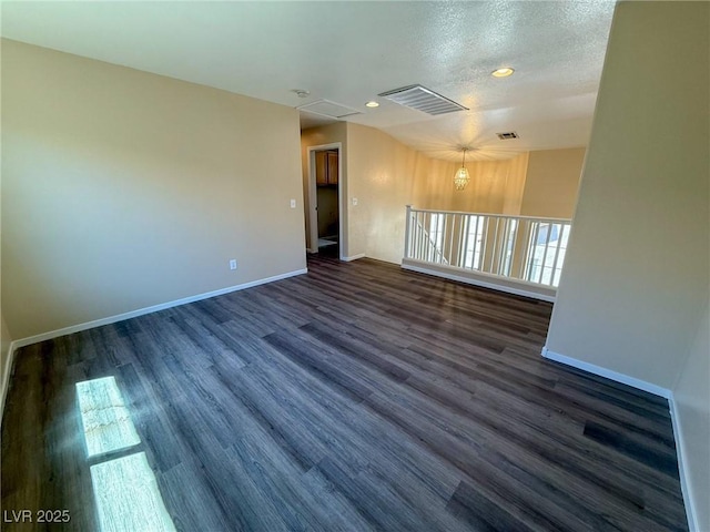 3736 Gallowtree Ave, North Las Vegas, NV 89081 - spare room featuring dark wood-type flooring, recessed lighting, and a textured ceiling