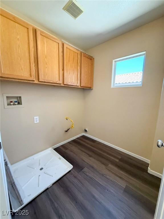 3736 Gallowtree Ave, North Las Vegas, NV 89081 - laundry room featuring cabinet space, washer hookup, and dark wood-type flooring