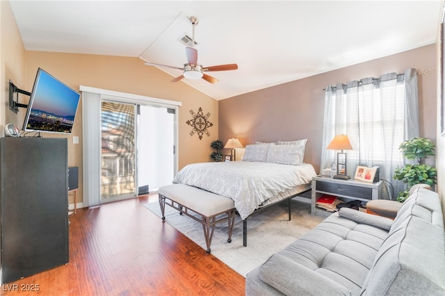 2789 Trotwood Ln, Las Vegas, NV 89108 - bedroom with access to outside, lofted ceiling, wood finished floors, and ceiling fan