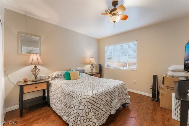 2789 Trotwood Ln, Las Vegas, NV 89108 - bedroom featuring baseboards, wood finished floors, and ceiling fan