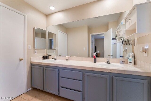 2789 Trotwood Ln, Las Vegas, NV 89108 - full bath featuring double vanity and tile patterned flooring