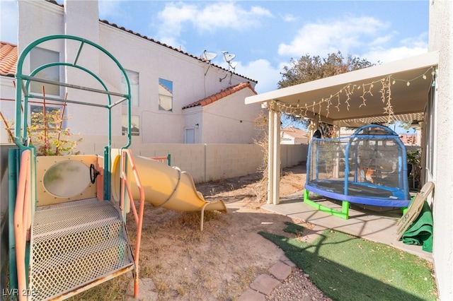 2789 Trotwood Ln, Las Vegas, NV 89108 - view of jungle gym featuring a trampoline