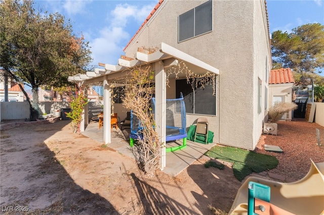 2789 Trotwood Ln, Las Vegas, NV 89108 - fenced backyard with a patio