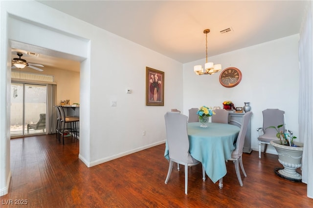 2789 Trotwood Ln, Las Vegas, NV 89108 - dining space featuring a chandelier, wood finished floors, baseboards, and ceiling fan