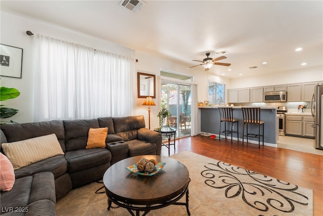 2789 Trotwood Ln, Las Vegas, NV 89108 - living area featuring wood finished floors, ceiling fan, and recessed lighting