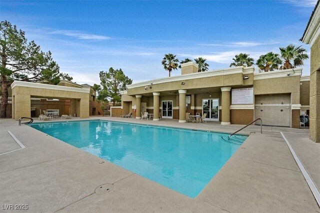 8070 W Russell Rd Unit 1036, Las Vegas, NV 89113 - community pool with a patio