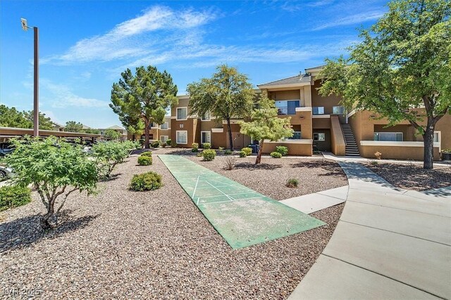 8070 W Russell Rd Unit 1036, Las Vegas, NV 89113 - view of community featuring shuffleboard and stairway
