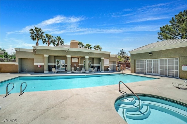 8070 W Russell Rd Unit 1036, Las Vegas, NV 89113 - community pool with a patio and a community hot tub