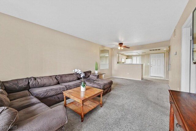8070 W Russell Rd Unit 1036, Las Vegas, NV 89113 - carpeted living area featuring ceiling fan and baseboards