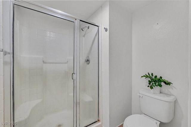 8070 W Russell Rd Unit 1036, Las Vegas, NV 89113 - full bathroom featuring toilet and a shower stall