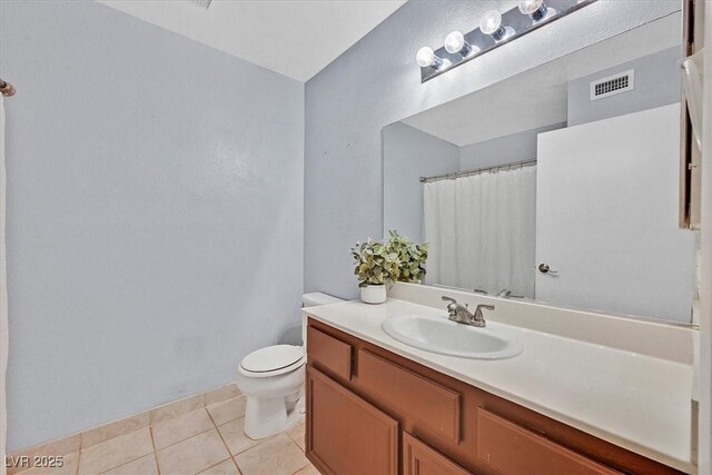 8070 W Russell Rd Unit 1036, Las Vegas, NV 89113 - full bath with vanity, toilet, tile patterned floors, and a shower with shower curtain
