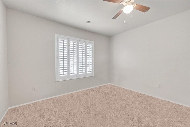 8070 W Russell Rd Unit 1036, Las Vegas, NV 89113 - empty room featuring carpet floors, baseboards, and ceiling fan