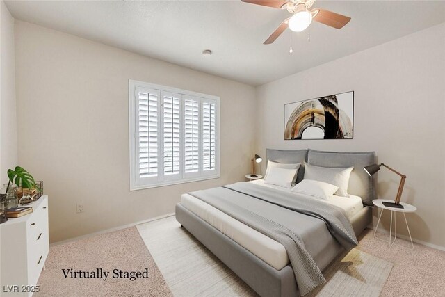 8070 W Russell Rd Unit 1036, Las Vegas, NV 89113 - bedroom with baseboards, carpet, and a ceiling fan
