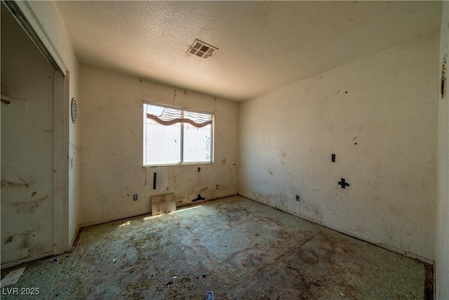1436 Padre Bay Dr, Las Vegas, NV 89108 - spare room with a textured ceiling