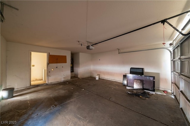 1436 Padre Bay Dr, Las Vegas, NV 89108 - garage featuring a garage door opener and washer / dryer