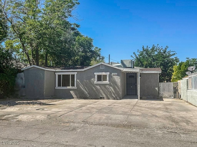 2713 Valley St, Las Vegas, NV 89101 - back of property featuring stucco siding and a patio area