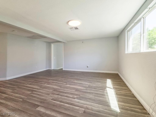 2713 Valley St, Las Vegas, NV 89101 - spare room featuring baseboards and wood finished floors