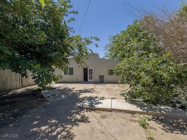 2713 Valley St, Las Vegas, NV 89101 - back of house with stucco siding and a patio area