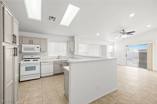 5112 Foggia Ave, Las Vegas, NV 89130 - kitchen with white appliances, light countertops, light tile patterned flooring, a sink, and recessed lighting