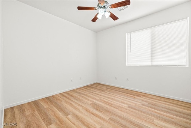 5112 Foggia Ave, Las Vegas, NV 89130 - spare room with light wood-style flooring, baseboards, and a ceiling fan