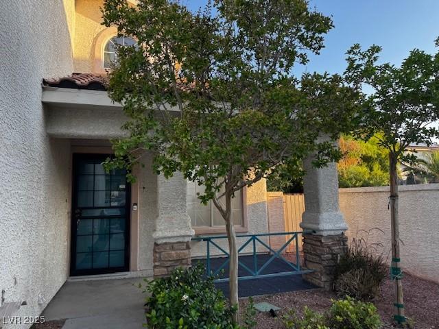 2419 Pebble Springs Ct, Henderson, NV 89074 - doorway to property featuring stucco siding
