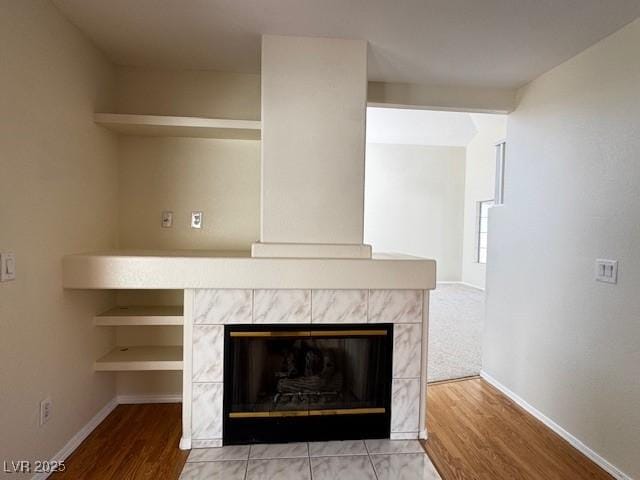 2419 Pebble Springs Ct, Henderson, NV 89074 - detailed view of wood finished floors and a tiled fireplace