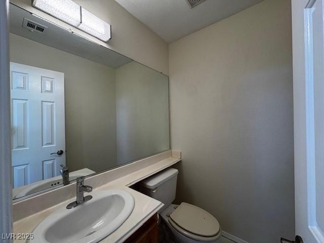 2419 Pebble Springs Ct, Henderson, NV 89074 - half bath with vanity and toilet