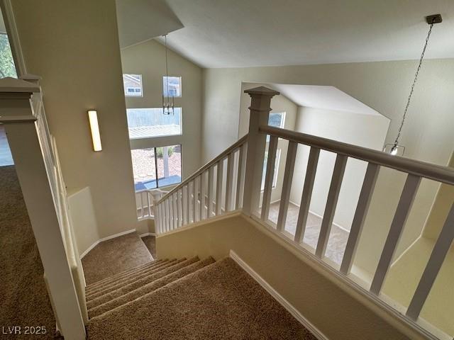 2419 Pebble Springs Ct, Henderson, NV 89074 - stairway with carpet floors and lofted ceiling