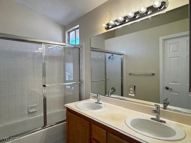2419 Pebble Springs Ct, Henderson, NV 89074 - bathroom featuring combined bath / shower with glass door, double vanity, and lofted ceiling