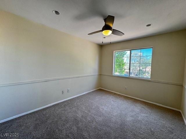 2419 Pebble Springs Ct, Henderson, NV 89074 - carpeted empty room with baseboards and a ceiling fan