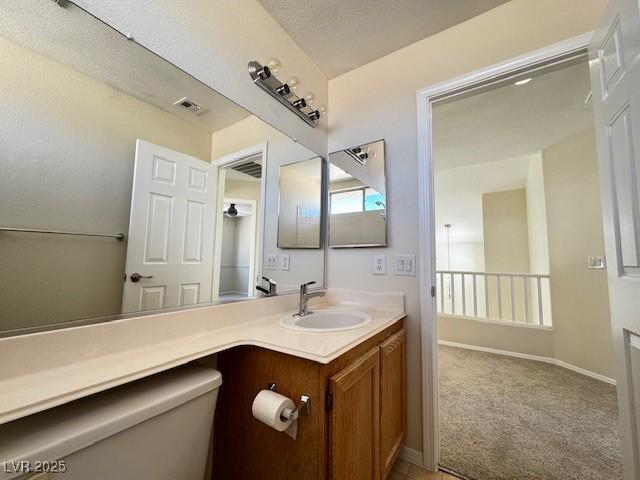 2419 Pebble Springs Ct, Henderson, NV 89074 - bathroom with vanity and toilet