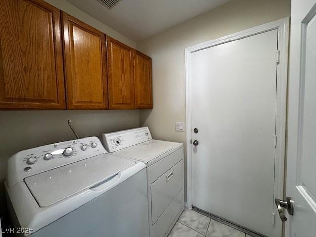 2419 Pebble Springs Ct, Henderson, NV 89074 - laundry room with washer and dryer and cabinet space