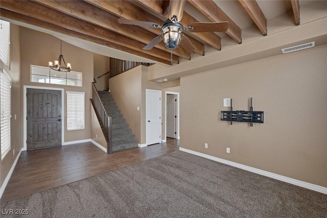 5816 Glory Canyon Way, Las Vegas, NV 89142 - entryway with stairs, beamed ceiling, a chandelier, baseboards, and dark carpet