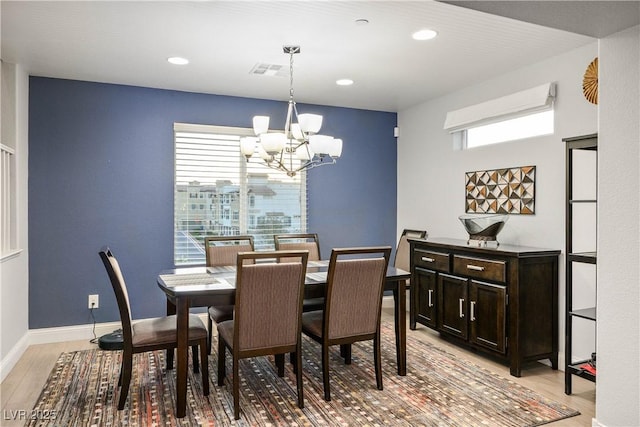 51 Morning Mimosa Ct, Henderson, NV 89012 - dining space with a chandelier, light wood finished floors, plenty of natural light, recessed lighting, and baseboards