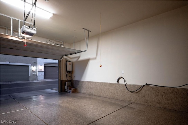 51 Morning Mimosa Ct, Henderson, NV 89012 - garage with a garage door opener and tankless water heater