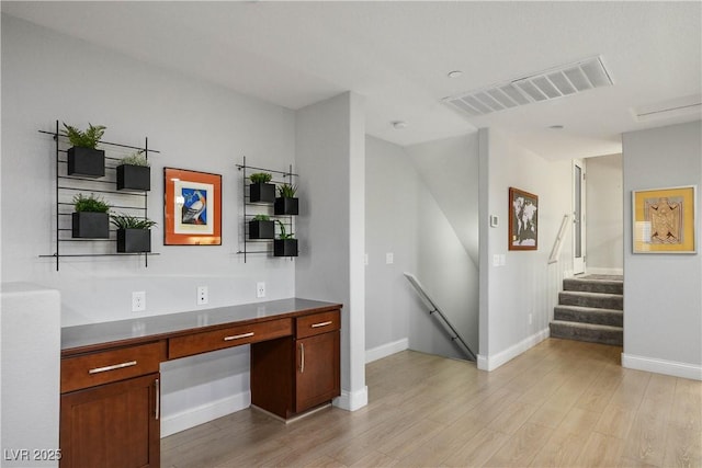 51 Morning Mimosa Ct, Henderson, NV 89012 - bar featuring light wood-style floors, baseboards, and built in study area