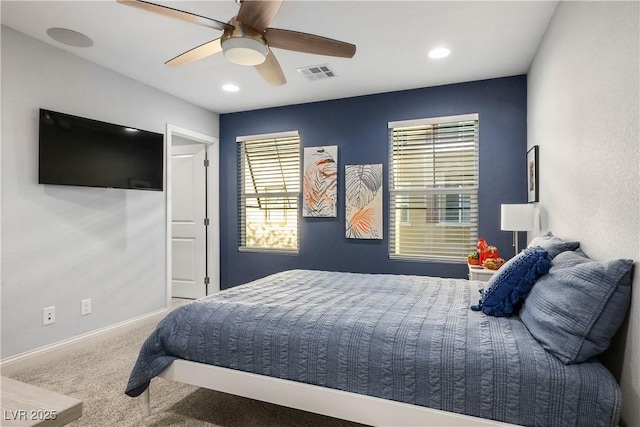 51 Morning Mimosa Ct, Henderson, NV 89012 - bedroom featuring carpet flooring, multiple windows, recessed lighting, a ceiling fan, and baseboards